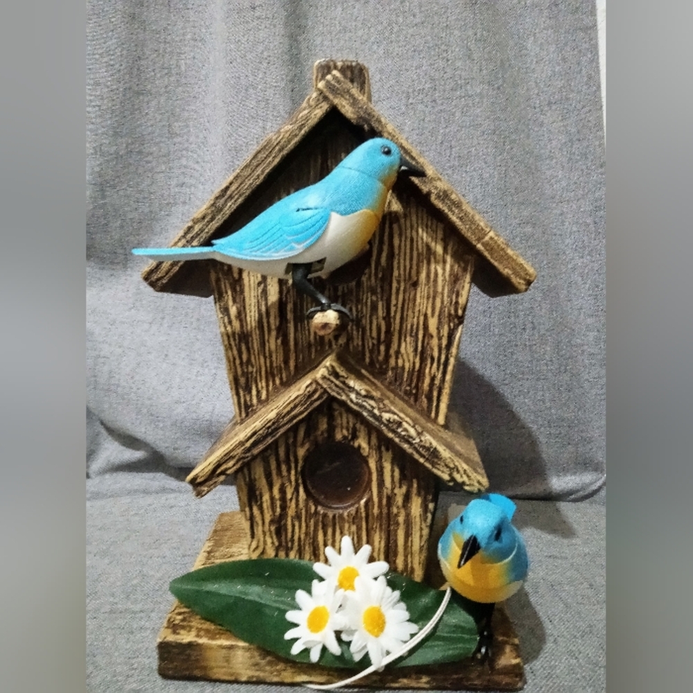 Motion activated singing bird house decor